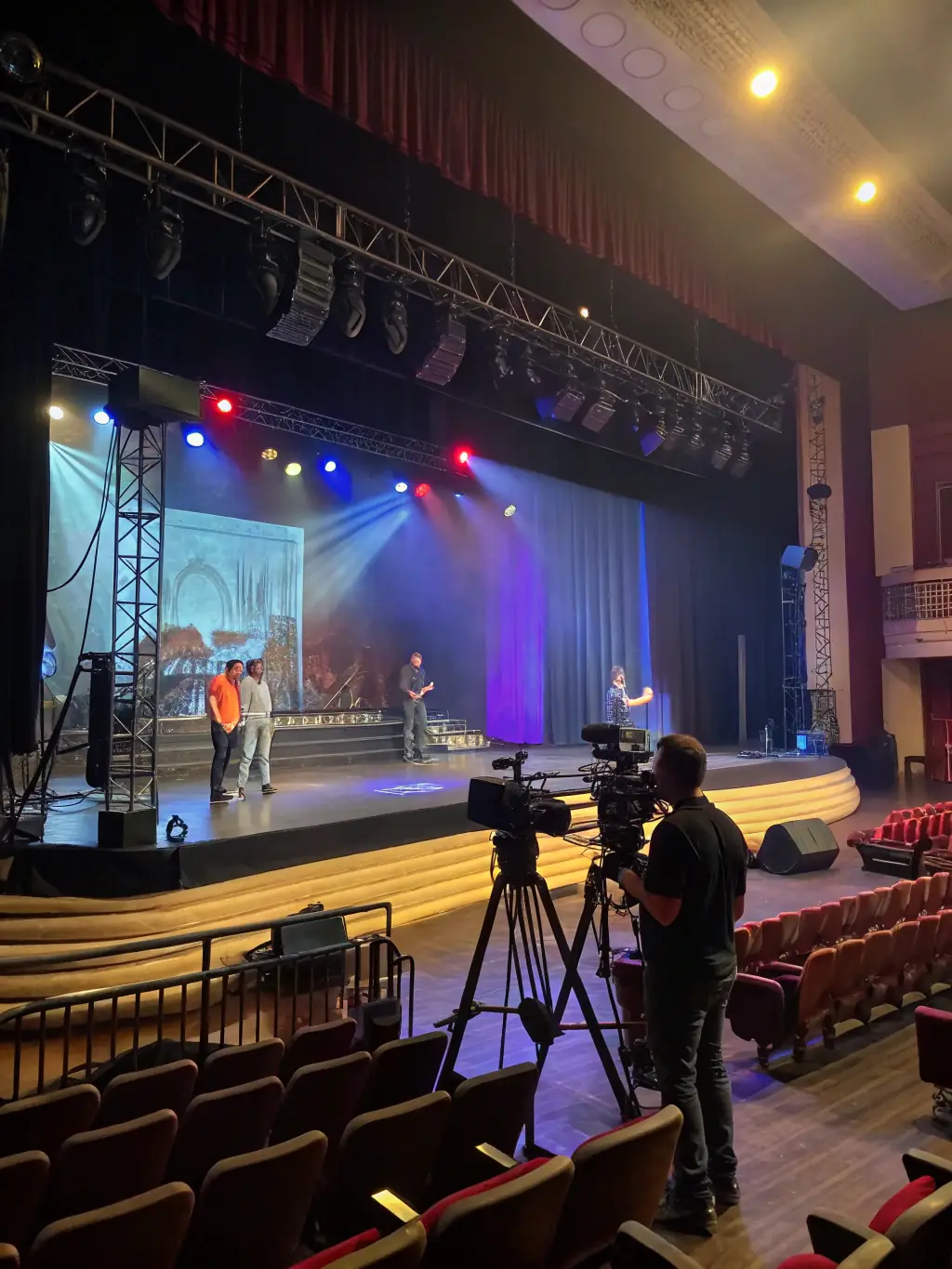 A dynamic shot of a concert stage being set up with advanced lighting and sound equipment, showcasing PISOKING CASINO's technical production capabilities.